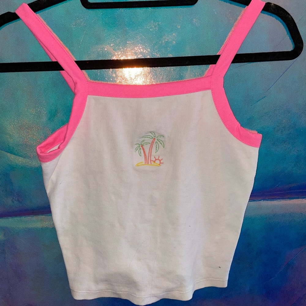 Cute neon pink and white crop tops with embroidered palm trees! 🏝